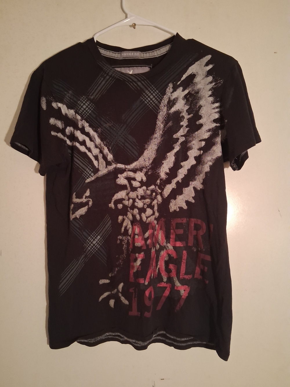 American Eagle Outfitters Black Tee with Eagle Graphic and Red Text